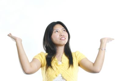 A young woman saying 'Sorry' to God